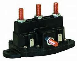 Aero‑style reversing relay with three copper terminal studs and multiple electrical connectors mounted on a black rectangular base, shown on a white background.