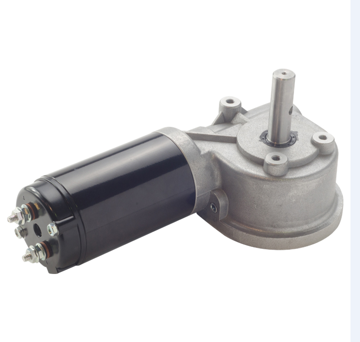 Electric tarp motor assembly with a cylindrical black motor housing attached to a silver metal gear case and vertical output shaft, shown against a plain light background.