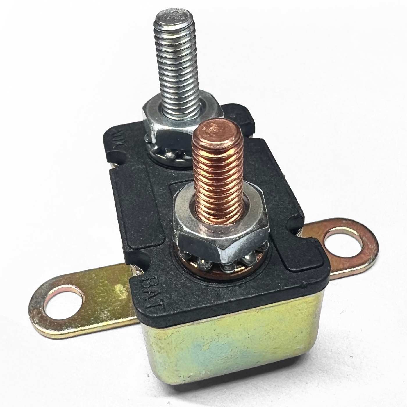 Heavy‑duty electrical circuit breaker with two threaded terminal studs—one copper and one steel—mounted on a black insulating base with metal mounting tabs, shown on a white background.
